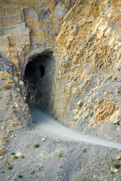 Road blasted through a narrow tunnel