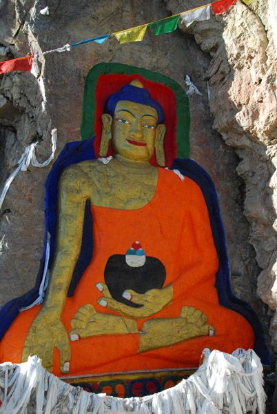 Large rock-cut painted Great Buddha at km 11