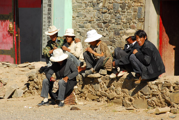 Tibetans waiting for the bus perhaps