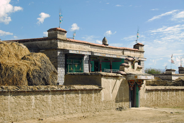 Tibetan home with a large haystack