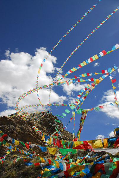 Prayer flags blowing in the strong wind