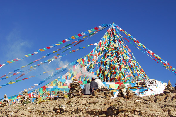 Prayer flags at the windy and cold summit of the Gampa-la Pass