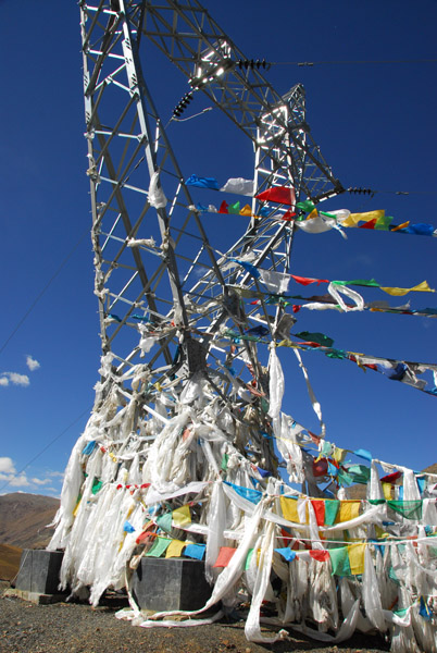 Transmission tower supporting prayer flags, Simi-la