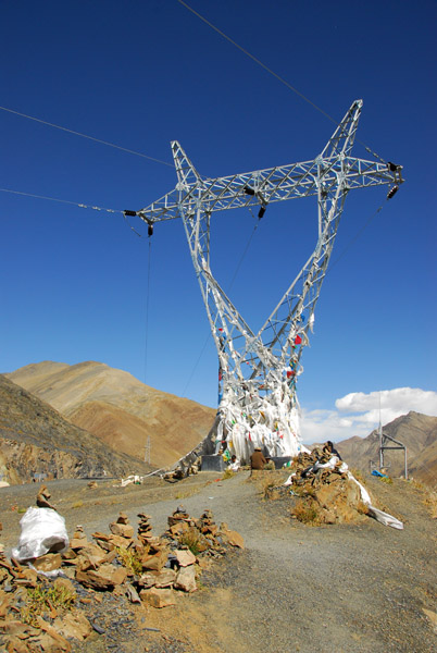 Transmission tower supporting prayer flags, Simi-la