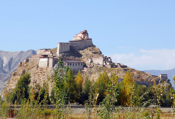 The hilltop fortress at Gyantse dominates the flag valley around it