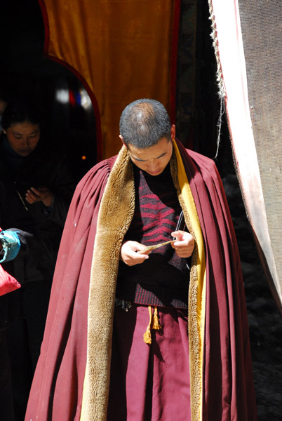 Sakyapa (red hat) monk, Sakya Monastery