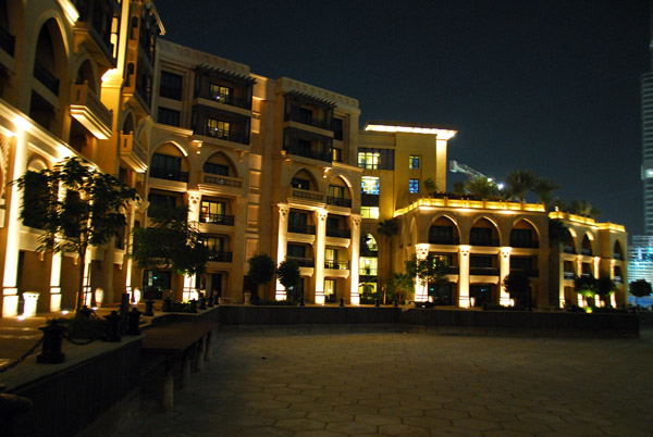 The Palace Hotel at night with Burj Dubai