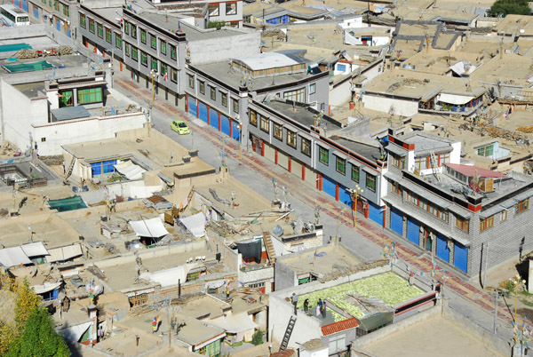 Road cut through Old Town Shigatse