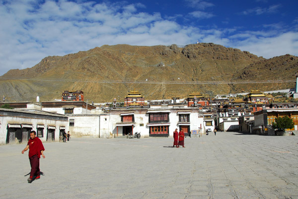 From the courtyard of Tashilhunpo there is a view of the monastery's four dominant structures that line the northern side of the