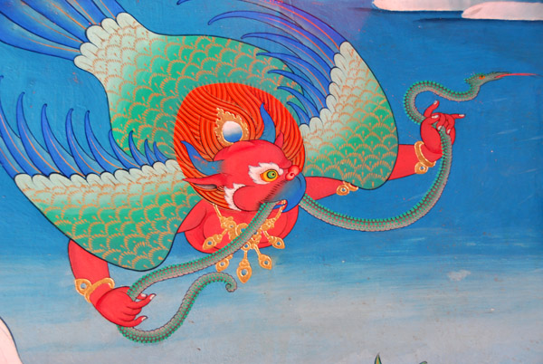 Garuda flying with a snake