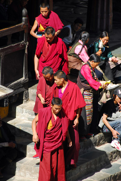 Monks leaving the assembly hall