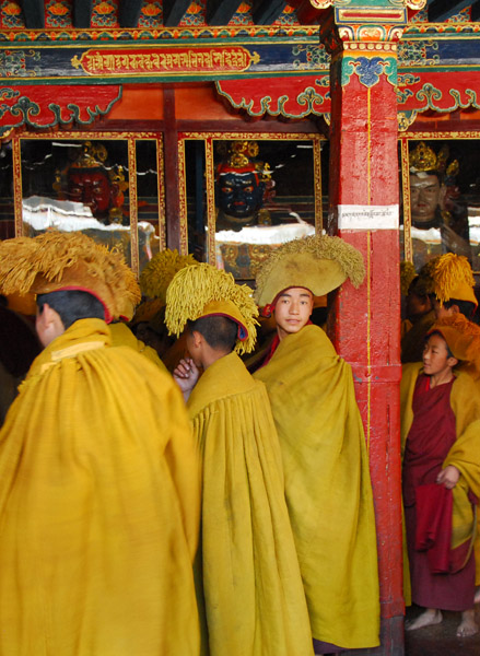 Gelugpa monks entering the assembly hall