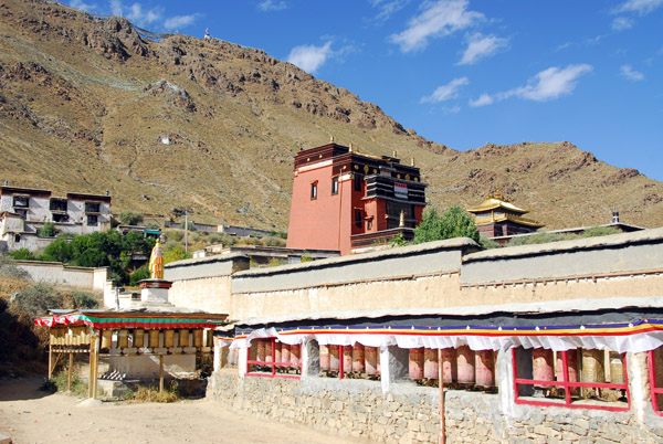 Tashilhunpo Kora Circuit marked by a continuous string of prayer wheels