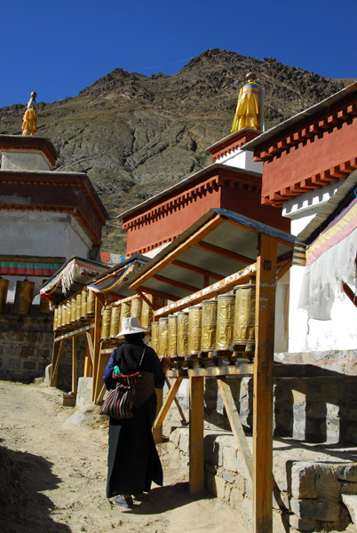 Tibetan woman walking the Tashilhunpo Kora Circuit