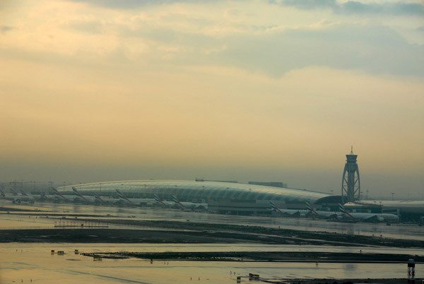 Early morning after a thunderstorm with the new terminal at DXB