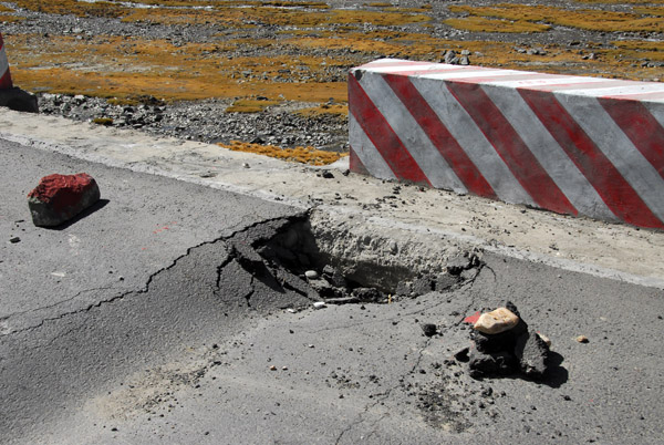The newly paved road is already damaged...