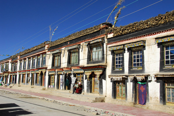 Shegar's main street lined with traditional Tibetan houses