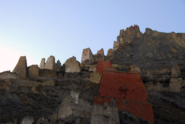Extensive ruins of Shegar Dzong rising above the monastery