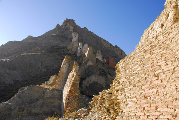 A large breach in the walls of Shegar Dzong