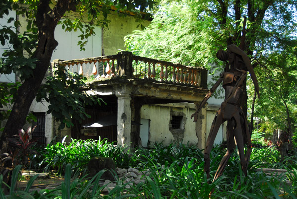 Unrestored building in the park of Fort Santiago still showing damage from World War II