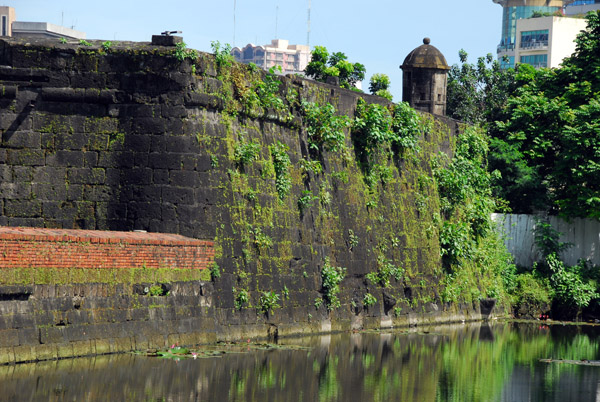 Moat and moss covered SE wall, Fort Santiago