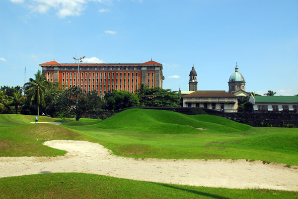 Golf course built along the walls of Intramuros