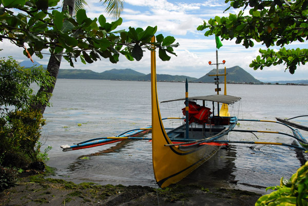 Small motorized banca (outrigger boat) on Lake Taal