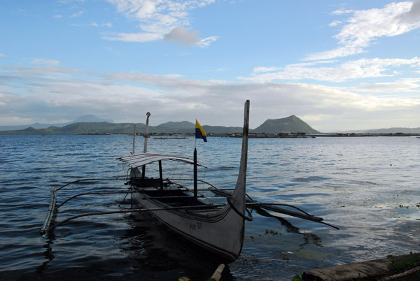Banca with Volcano Island in the distance across Lake Taal