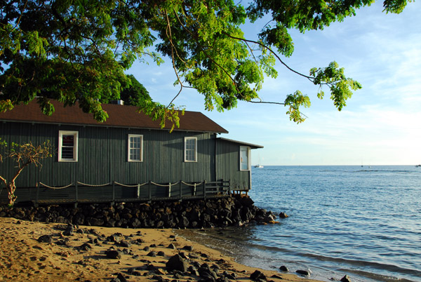 Waterfront building with a small piece of beach