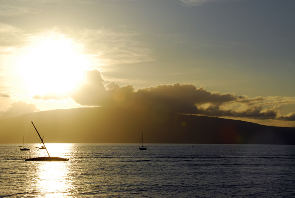 Sunset from Lahaina with a wrecked sailboat and the island of Lanai