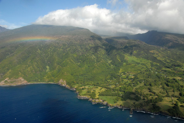 A rainbow with the southeast coast of Maui
