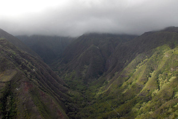 The summit of the West Maui Mountains is hidden in thick cloud but we have a high enough ceiling to fly up the Waihee Valley