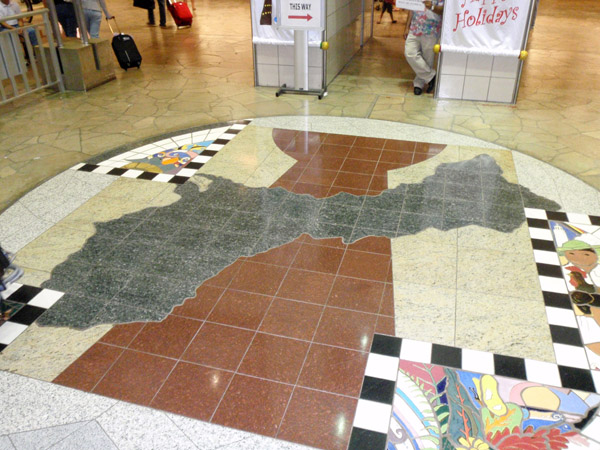 Tile map of Guam at the airport