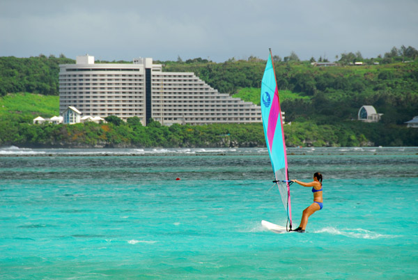 Windsurfing Tumon Bay with the Nikko Hotel in the background