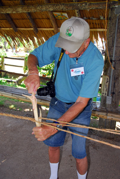 Dad making rope