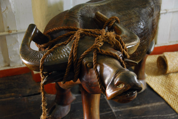 Wooden water buffalo with rope
