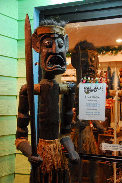 Life-size wooden sculpture at the Palau Shop, Koror