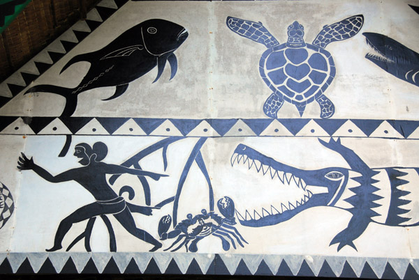 Villager running from the crocodile on a Palauan painted storyboard