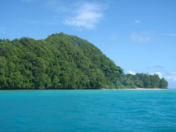 The Rock Islands of Palau are steep forest covered limestone karst islands