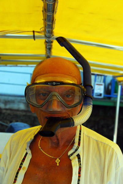 Dad trying on his snorkel gear