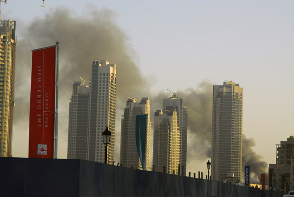 Smoke behind the Burj Dubai residences