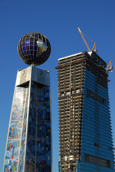 World Bank/International Monetary Fund 2003 Meeting monument and Sama Tower, under construction, Trade Centre Roundabout