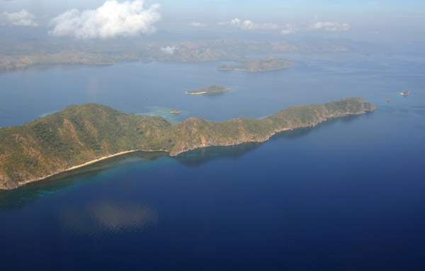 Descent for Busanga over narrow Cabilauan Island, Philippines