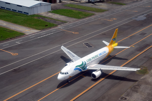 Cebu Pacific A320 taxiing for Rwy 13 at MNL (RP-C3242)