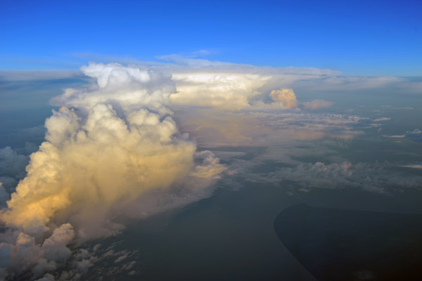 Early morning thurnderstorm off the southern tip of Borneo (S04/E115)