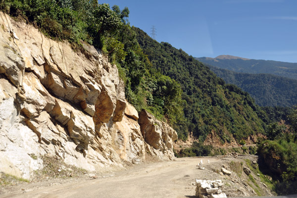 An unpaved section of the Phuentsholing-Thimpu Road