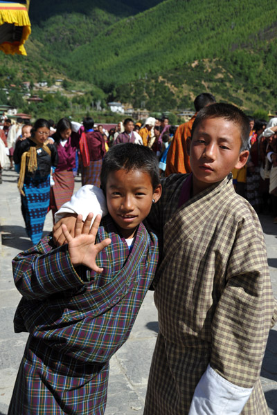 A Bhutanese boy showing off his 6th finger
