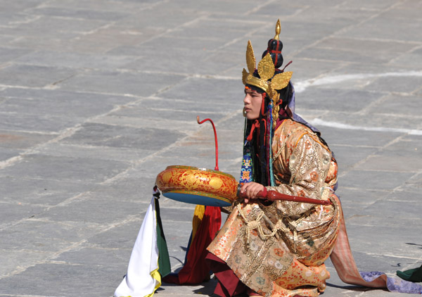 Bhutanese dancer with drum, Tsechu Festival