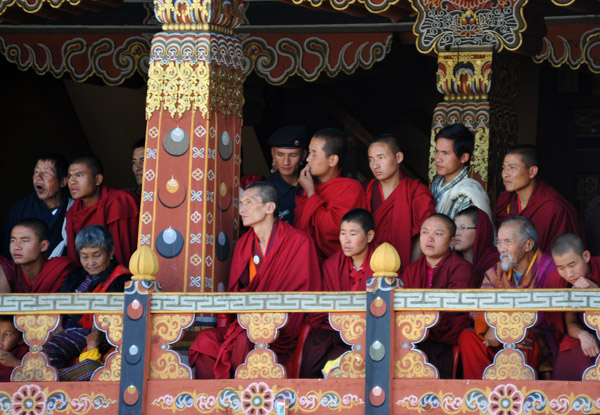 Monks lining the balcony to watch the dancers