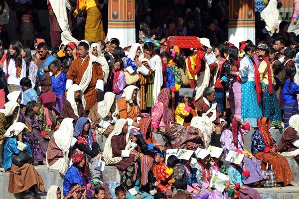 Crowds of Bhutanese gathered to watch the Cham dances of the Tsechu Festival, Thimphu